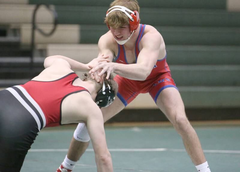 Morrison's Logan Baker wrestles Orion's Kaden Edmunds during a triangular meet on Wednesday, Jan. 18, 2023 at St. Bede Academy.