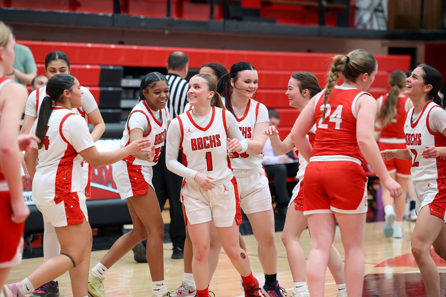 Bradley-Bourbonnais players rush to celebrate a 3-pointer at th