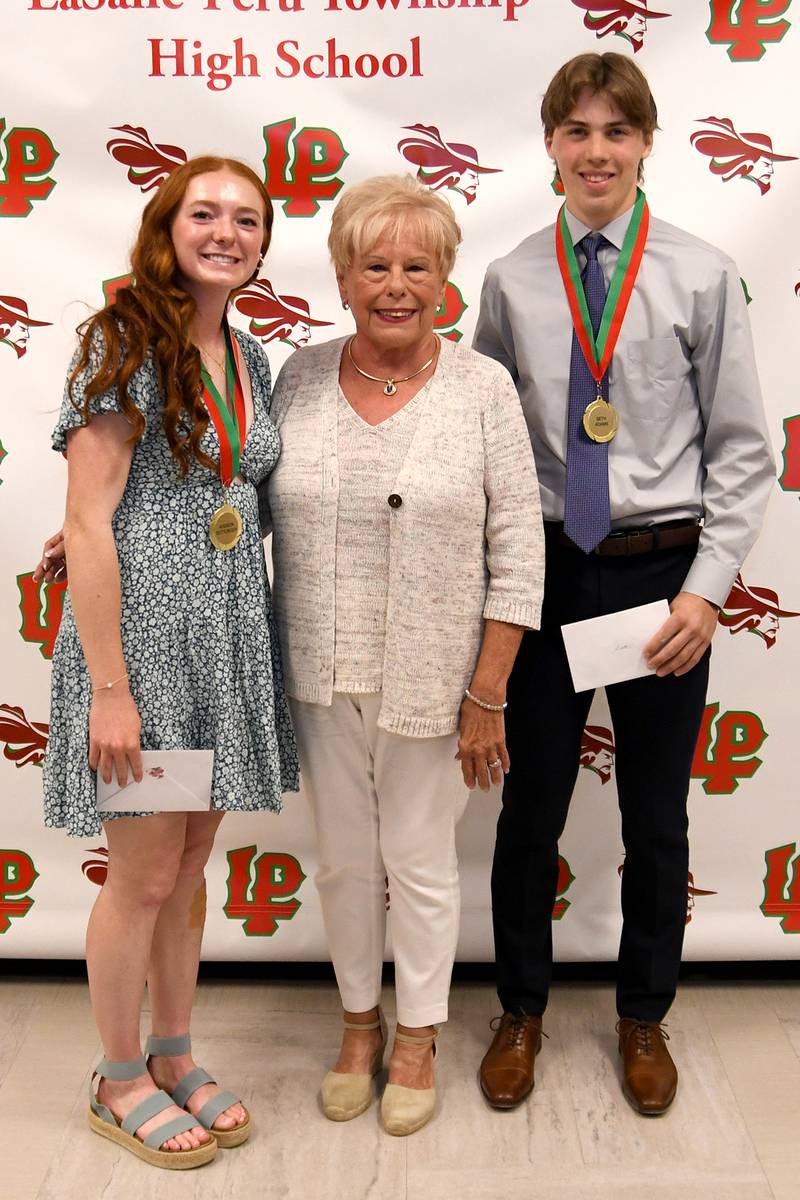 Addison Duttlinger (left) and Seth Adams (right) received the George Preston Blow Medal/John & Lucy Pomatto Scholarship, presented by Jane Riva (middle). The $1,500 scholarship is considered the highest award the L-P athletics department bestows. A recipient must have a GPA of at least 2.75 and have been outstanding in general athletics. Candidates are nominated by varsity head coaches and voted on by L-P administrators.