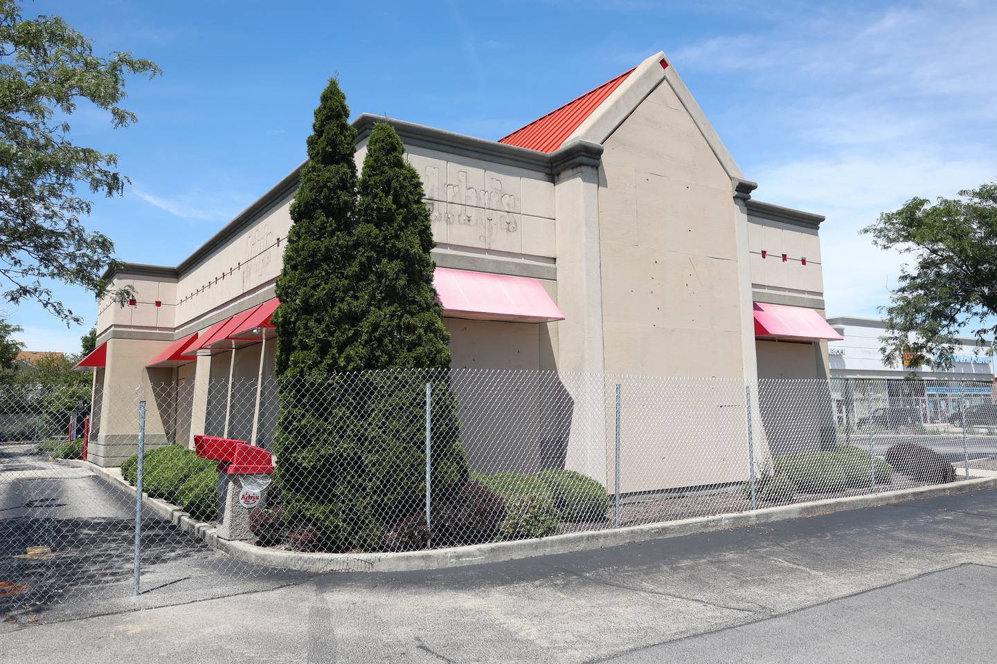 A fence was put up and signage was taken down and windows were boarded up at Arby’s on Route 59 on Monday July 1, 2024 in Plainfield.