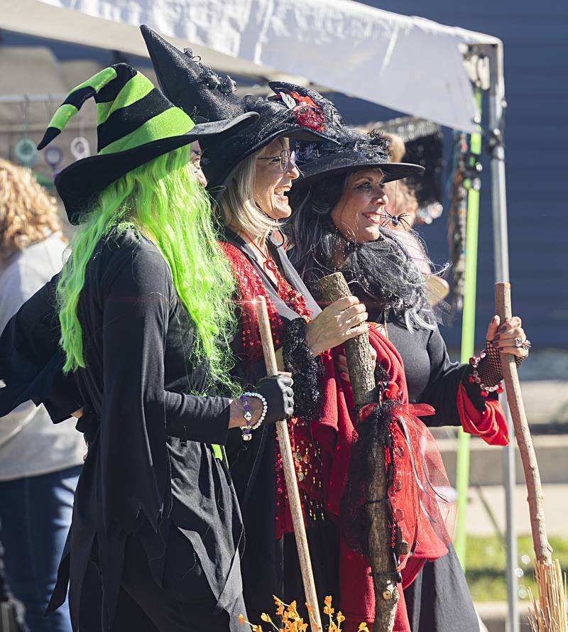 A coven of witches stop for photos Saturday, Oct. 21, 2023 during Dixon’s Scarecrow Fest. Mindy Cadogan (left), of Sterling, Teri Jahn of Lee Center and LuAnn McFadden of Rock Falls donned their best outfits for a day of fun in Dixon.