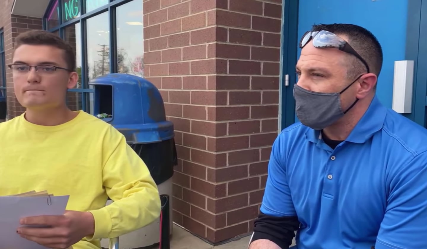 Shane Divis (left), a member of Save Our Siblings, speaking with John Resedean, in a YouTube video by the Save Our Siblings group, whose members proclaims is "committed to keeping our communities protected and safeguarding our youth."