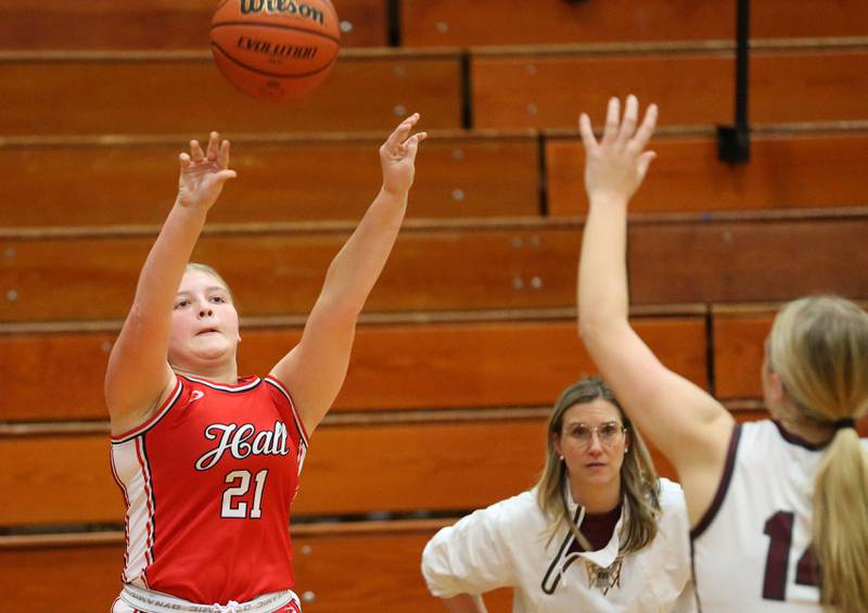 Hall's Ava Delphi shoots a wide-open jump shot over Illinois Valley Central's Kayt Miller during the Princeton Holiday Girls Basketball Tournament on Tuesday, Nov. 19, 2024 at Princeton High School.