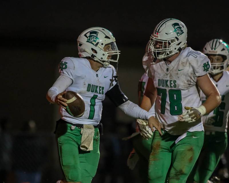 York's Bruno Massel celebrates a touchdown run during Class 8A second- round football game between York at Oswego on Friday, Nov 8, 2024  in Oswego.