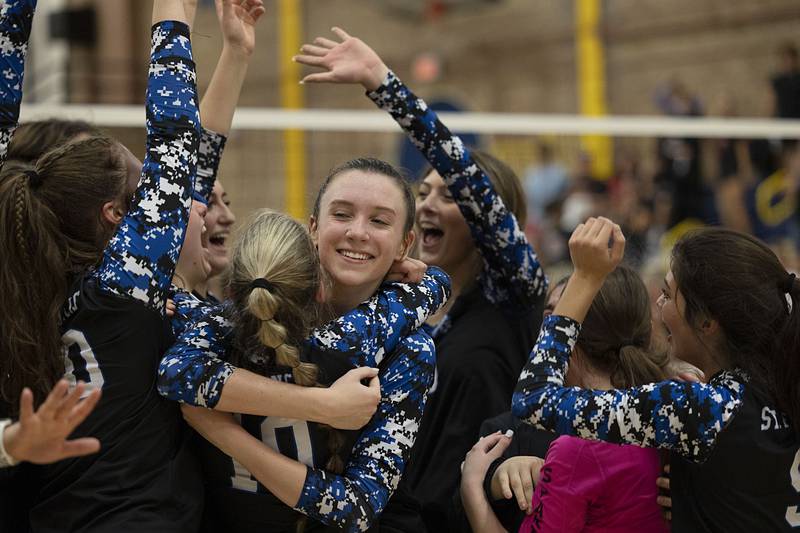 St. Francis celebrates the 3A supersectional after the Spartans defeated Metamora Friday, Nov. 4, 2022 in Sterling.