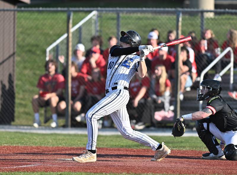 Lincoln-Way East's Zach Kwasny takes a cut against Lincoln-Way Central on Monday, April. 10, 2023, at Frankfort.
