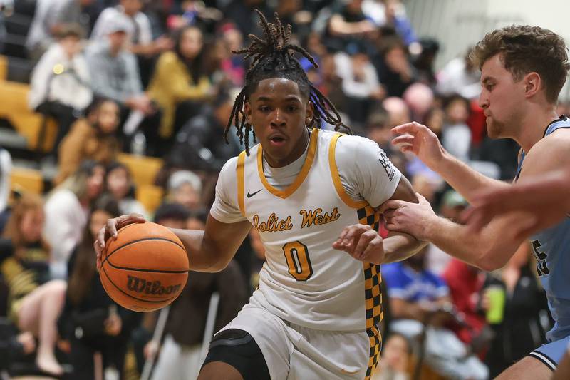 Joliet West’s Aamir Shannon makes a move to the basket against Kankakee on Wednesday, Feb. 18, 2026 in Joliet.