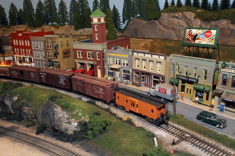 A freight train comes through a typical town from the 50's & 60's at the Lake County Model Railroad Club in Wauconda. The club is celebrating their 50th anniversary.