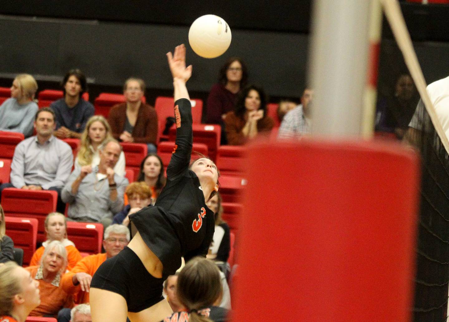 St. Charles East’s Kate Goudreau goes up for a kill during a Class 4A Proviso West Sectional final against Willowbrook on Wednesday, Nov. 2, 2022.