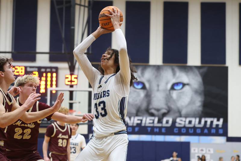 Plainfield South’s Isaiah Robertson puts up a shot against Morris on Wednesday, Jan. 28, 2026 in Plainfield.