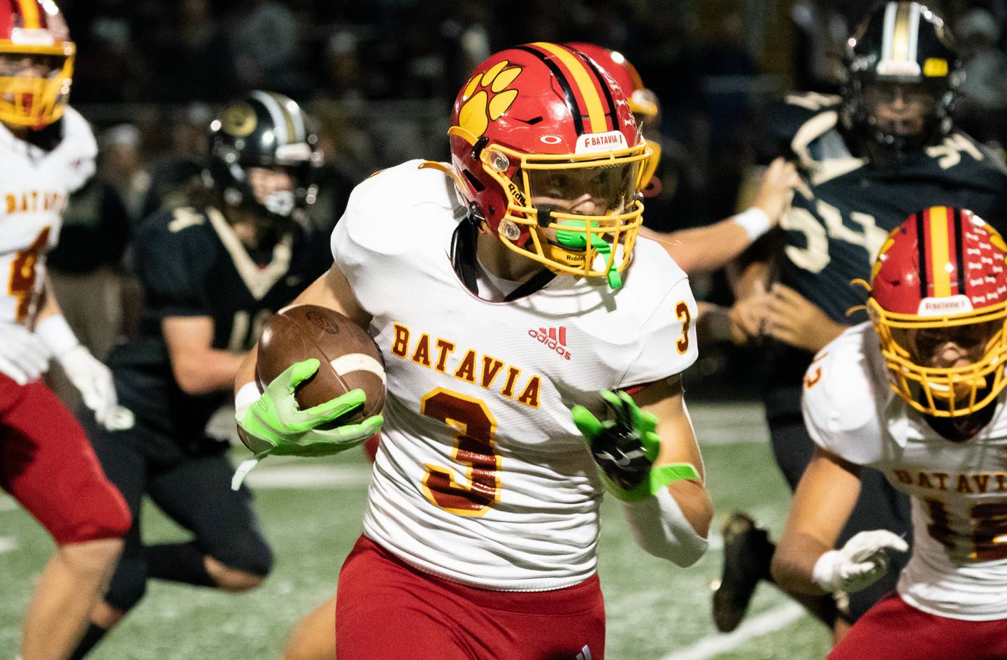 Batavia's Ryan Whitwell (3) carries the ball against Glenbard North during a football game at Glenbard North High School in Carol Stream on Friday, Sep 23, 2022.