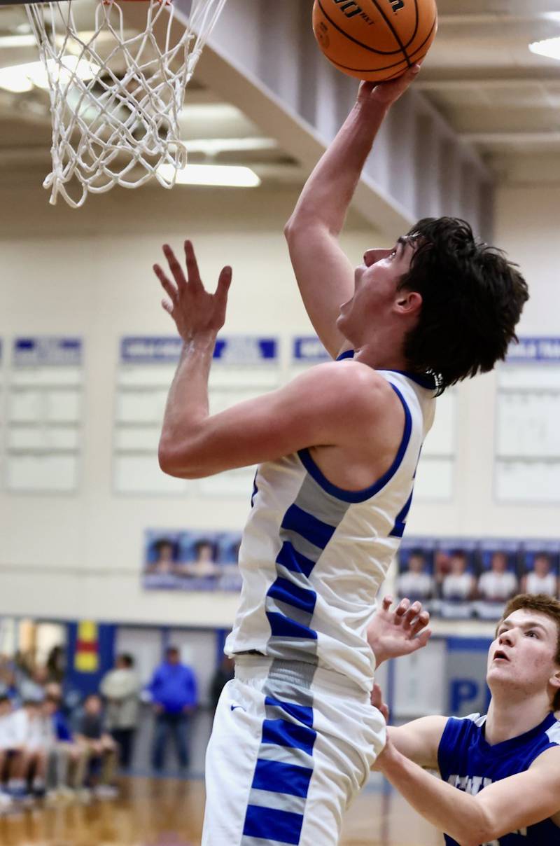 Princeton's Noah LaPorte shoots against Newman Friday night at Prouty Gym. The Tigers won 60-46.