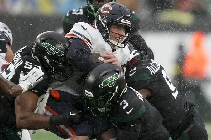 Chicago Bears quarterback Trevor Siemian  is sacked by the New York Jets during the second quarter, Sunday, Nov. 27, 2022, in East Rutherford, N.J.