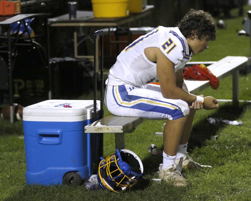 Johnsburg's Nicholas LoPresti sits on the bench during a non-conference football game Friday, Sept. 2, 2022, between Marian Central and Johnsburg at Marian Central High School.