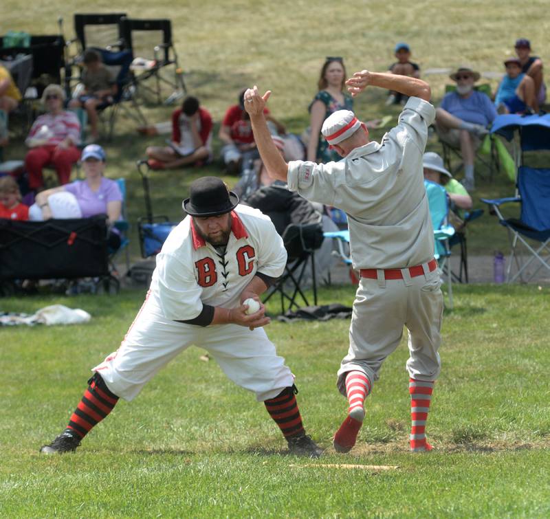 Oregon Ganymede Kevin Stafford moves to avoid the tag at home by the Bay City Independent catcher at the World Tournament of Historic Base Ball held at the Henry Ford Museum's Greenfield Village on Saturday, Aug. 9, 2025.