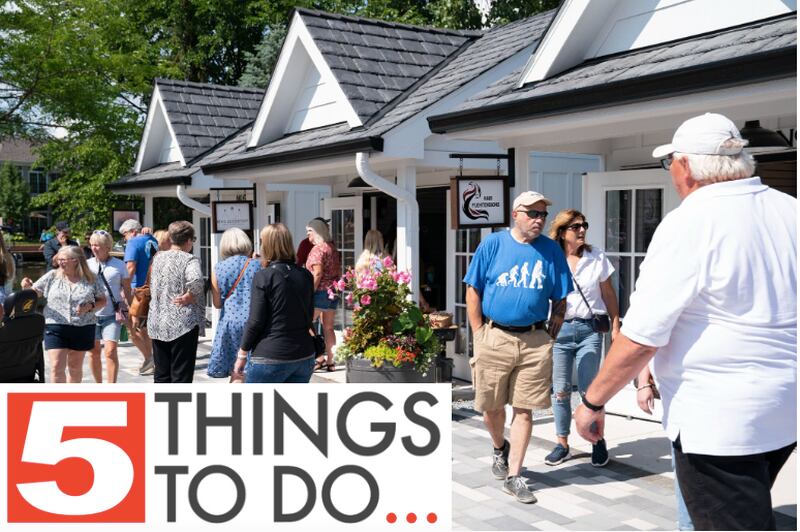 Shoppers explore the new collection of tiny shops at the grand opening and ribbon cutting of the new McHenry Riverwalk Shoppes in downtown McHenry on Friday, July 21, 2023. The Light the Night event will be Saturday, Sept. 16, 2023.