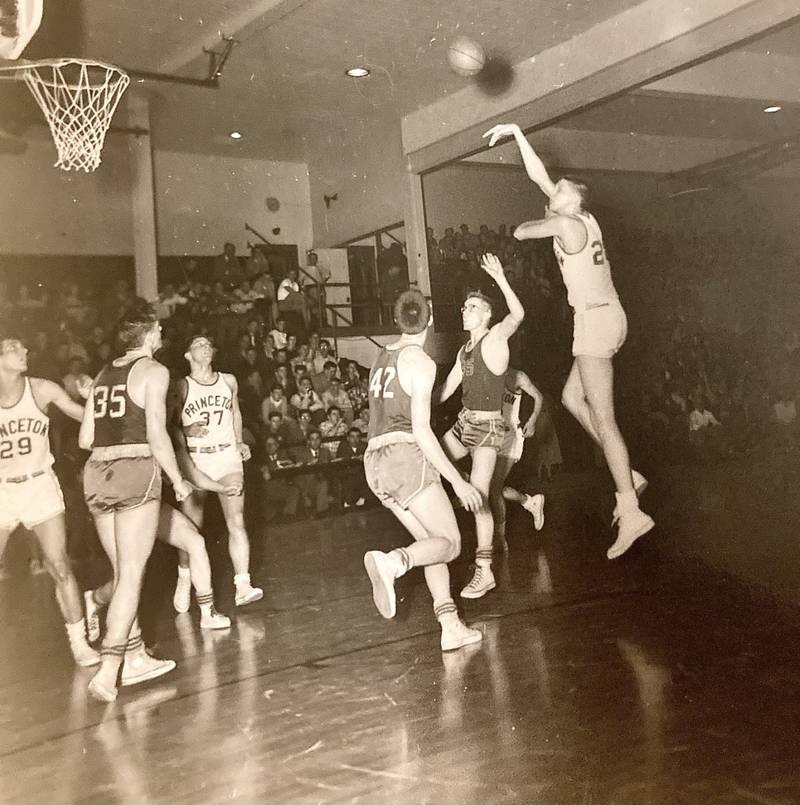 Princeton great Joe Ruklick displays one of his famous hook shots for the Tigers' 1954-55 state squad. He set the Princeton school scoring record with 1,306 career points and became a collegiate All-American for Northwestern and played in the NBA.
