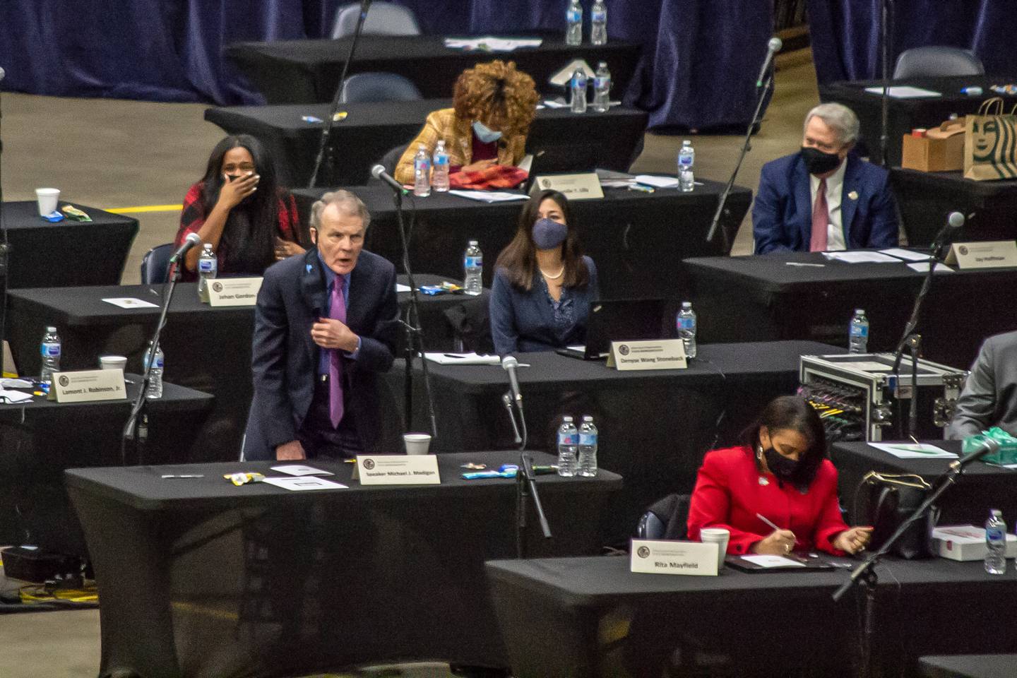 Former House Speaker Michael Madigan is pictured voting for his successor, Emanuel “Chris” Welch, on the floor of the Bank of Springfield Center in January 2021. It was serving as the House chamber at the time due to social distancing requirements brought on by the COVID-19 pandemic.