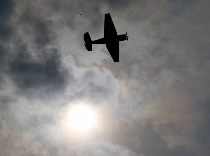 An TBM Avenger flies in the sky during the TBM Avenger Reunion on Friday, May 19, 2023 at the Illinois Valley Regional Airport in Peru.