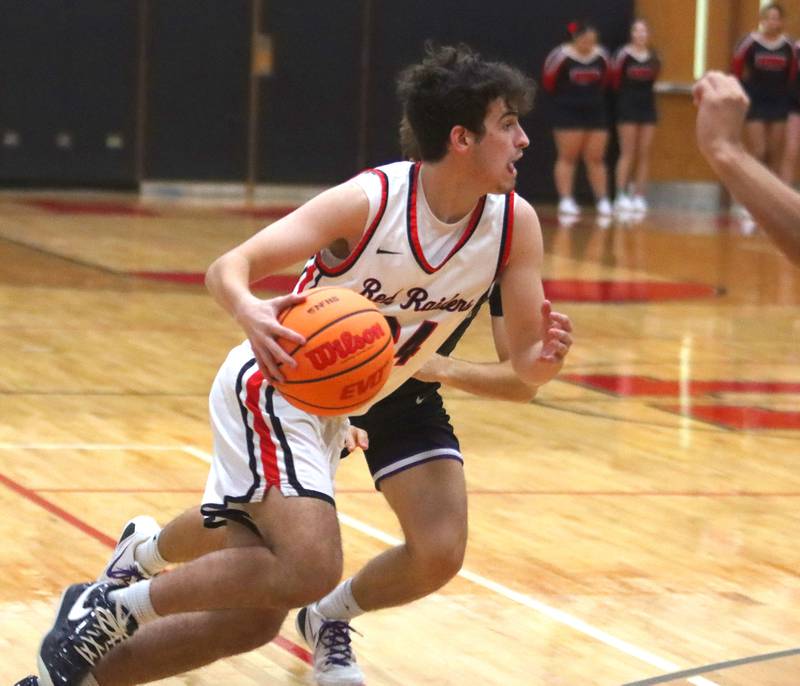 Huntley’s Casey Kaczmarski moves the ball against Hampshire in varsity boys basketball on Friday, Dec. 19, 2025, at Huntley High School in Huntley.