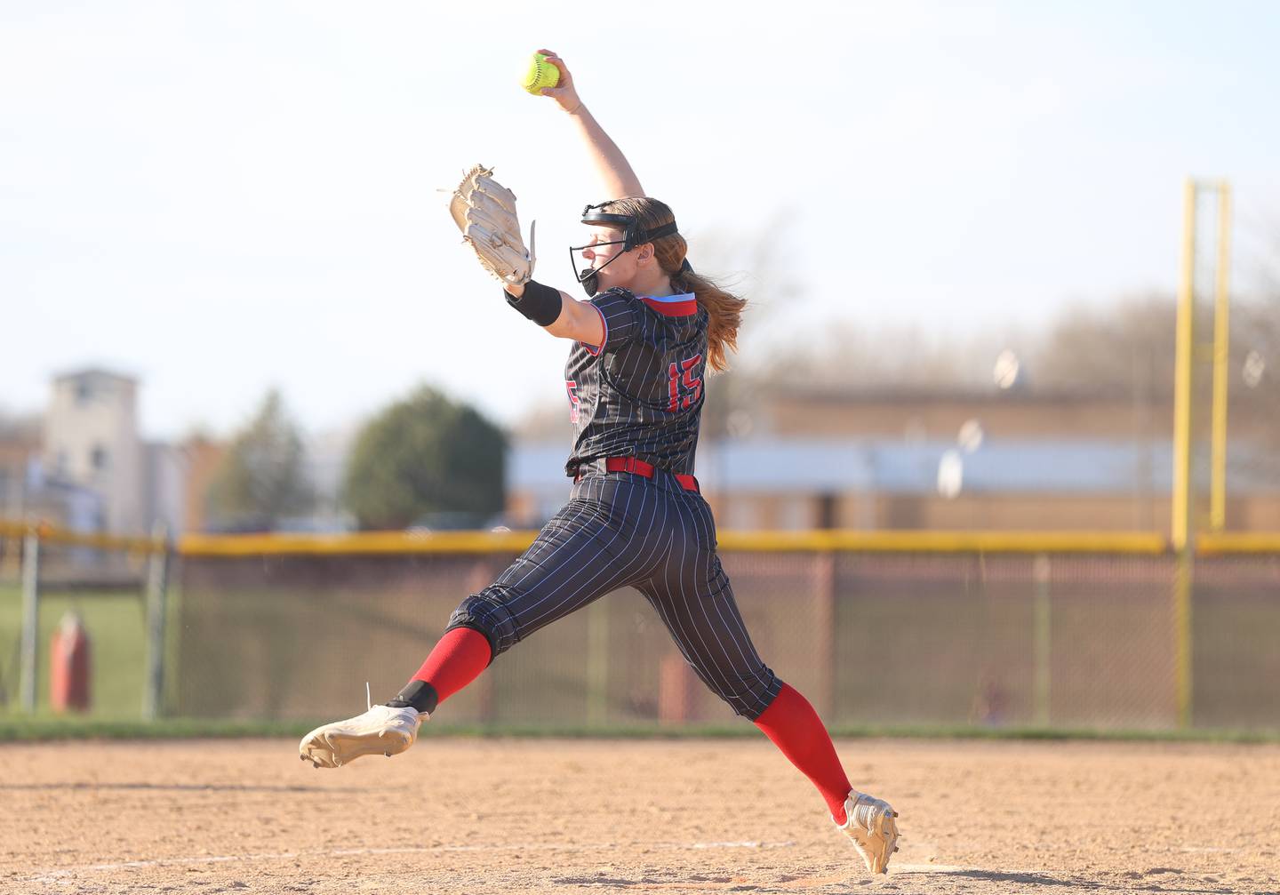 Ottawa’s Addie Russell delivers a pitch against Morris on Wednesday, April 8, 2026 in Morris.