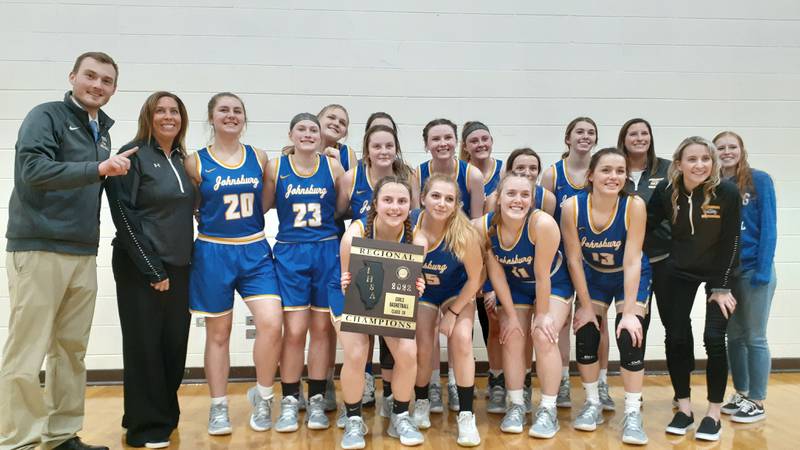Johnsburg poses for a team photo Thursday after defeating Rosary, 44-40, in overtime for the Class 2A Marian Central Regional championship in Woodstock.