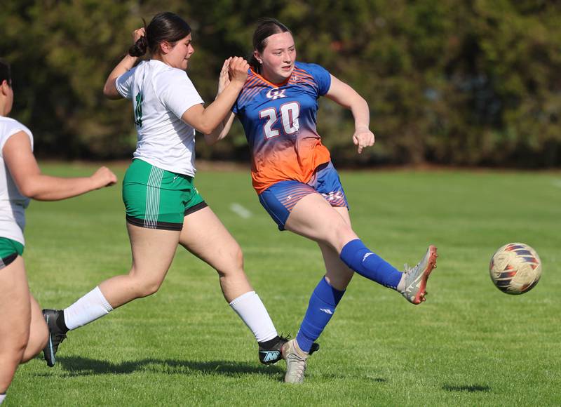 Genoa-Kingston's Olivia Leonforte (right) takes a shot Thursday, April 23, 2026, during their game against North Boone at Genoa-Kingston High School.