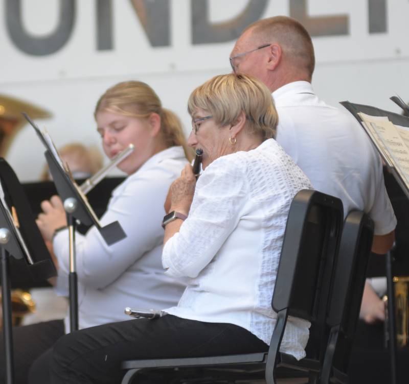 Noelle Girton, Miles Beske, and Sylvia Saunders perform with the Kable Concert Band on Wednesday, July 23, 2025 in Mt. Morris.