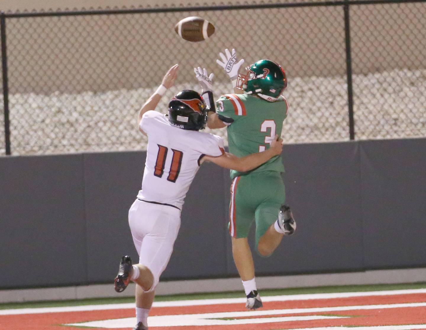 L-P's Michael Hartman catches a pass for a touchdown over Metamora's Shae Seals on Friday, Sept. 1, 2023 at Howard Fellows Stadium.
