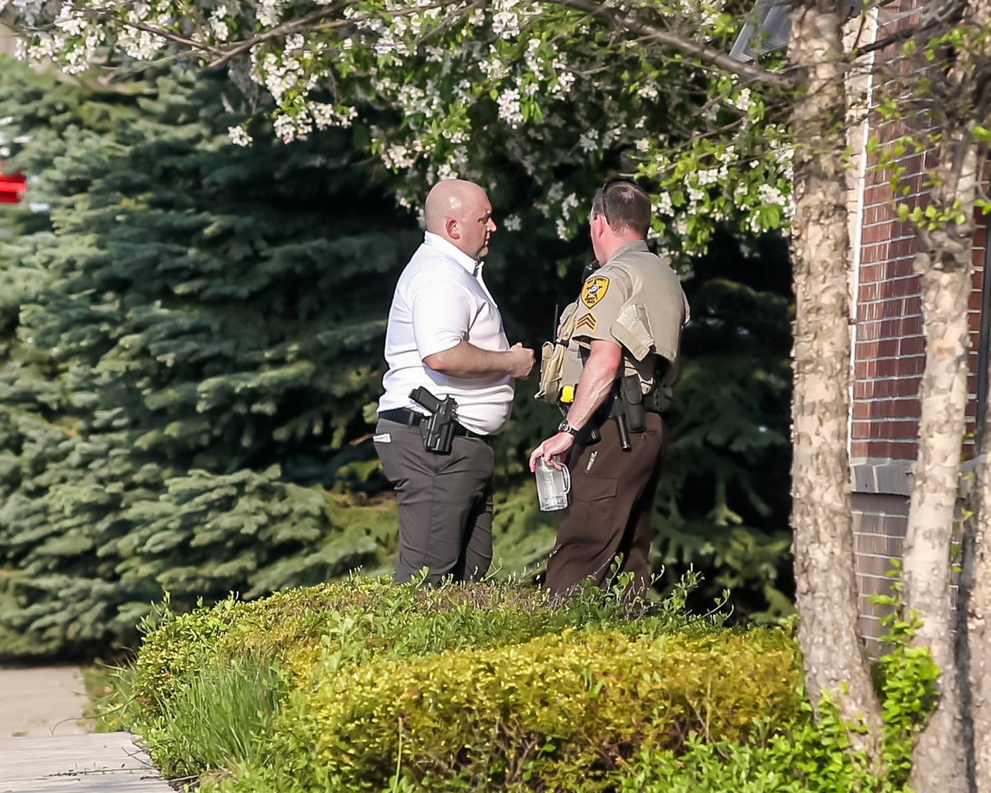 Officers at the scene of a hostage situation on May 10, 2022 at Fifth Third Bank in Romeoville.