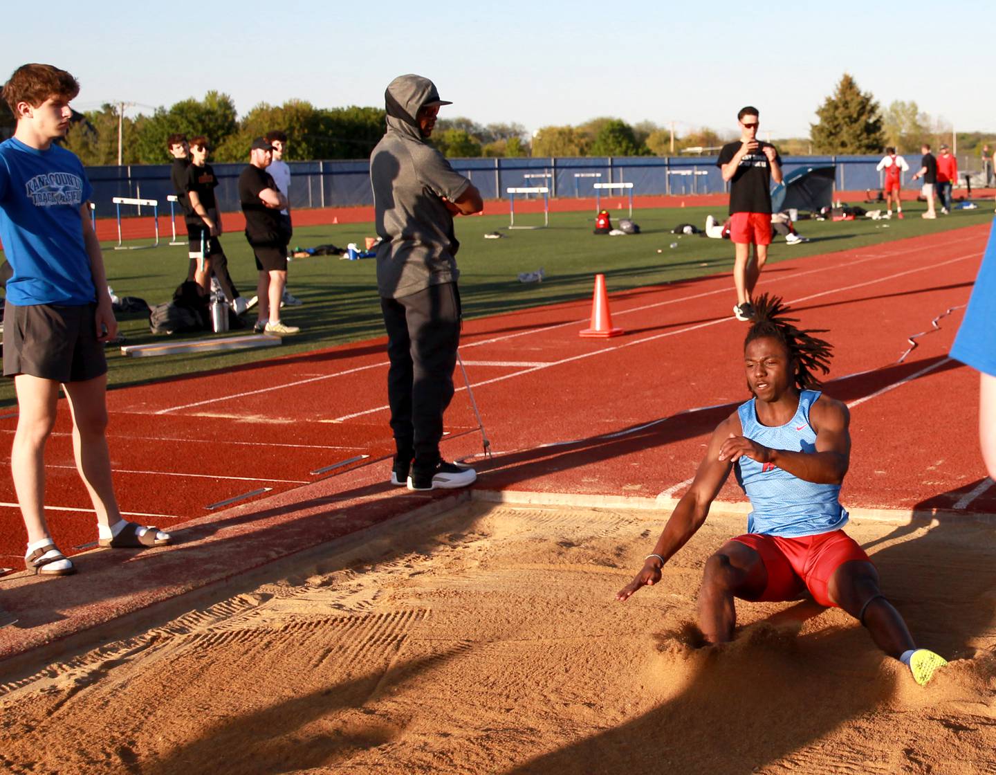 West Aurora’s Azuriah Sylvester competes in the triple jump during the Kane County boys track and field championships on Friday, May 9, 2025 at St. Charles North.