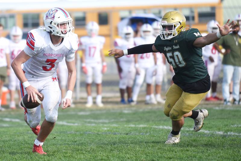 Marian Central's Colin Hernon, left, is pressured by Bishop McNamara's Victor Rosales during a game at Bishop McNamara Saturday, Oct. 4, 2025.