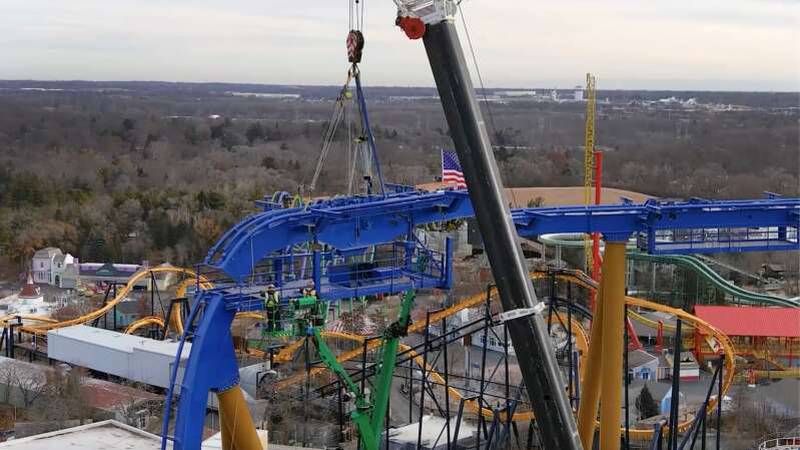 Crews placed the final piece of track connecting the lift hill portion to the drop of the Wrath of Rakshasa at Six Flags Great America in Gurnee.