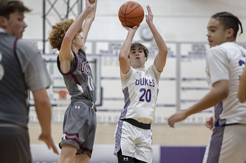 Dixon’s Mason Weigle puts up a shot Tuesday, Dec. 20, 2022 against IVC.