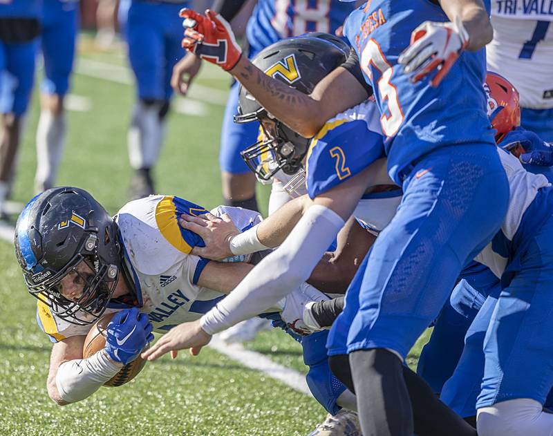 Tri-Valley’s Blake Regenold runs for yards against St. Teresa Decatur in the class 2A IHSA football state championship game Friday, Nov. 25, 2022.