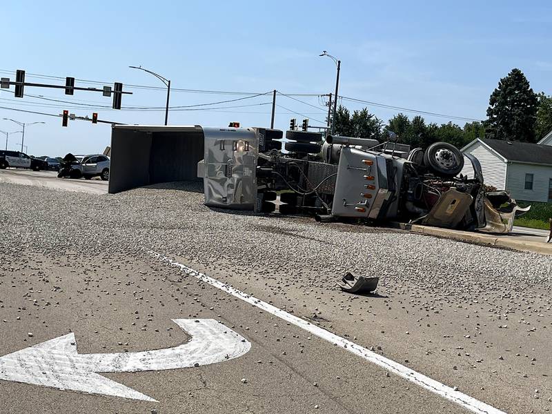 Ridge Road in Joliet covered in gravel after a semitrailer rolled from a collision with a Hyundai Santa Fe on Saturday, Aug. 16, 2025.