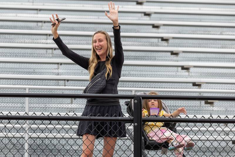 Carly Boender cheers on her family at Ben’s Memorial Mile, a community festival held every summer to raise money and awareness for mental health and suicide prevention in honor of Ben Silver, on Saturday, July 22, 2023.