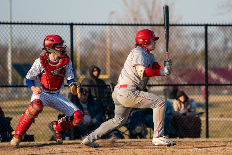 Yorkville's Kam Yearsley (17) singles against Marmion during a baseball game at Marmion High School in Aurora on Tuesday, Mar 28, 2023.