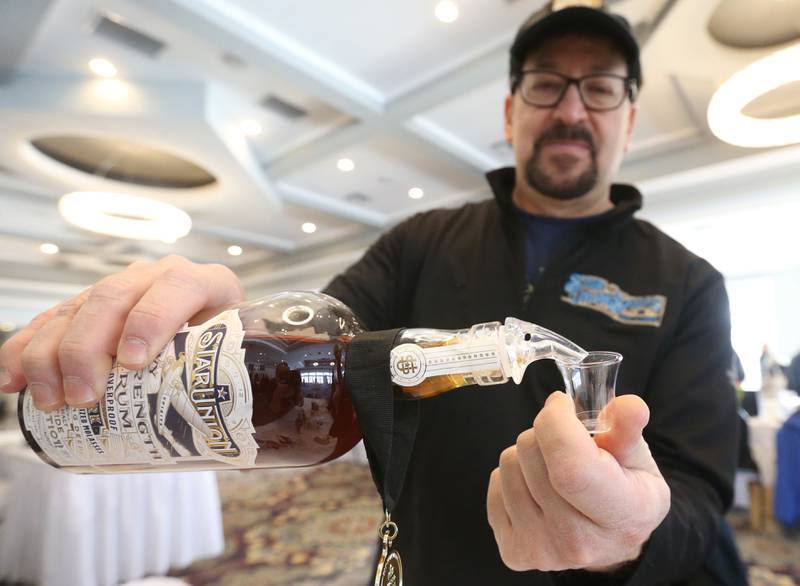 Jeff Yosowitz founder and owner of Star Union Spirits, pours a shot of rum during the Shaw Local Radio Bridal and Event Expo on Sunday, Feb. 23, 2025 at Senica's Oak Ridge in La Salle.