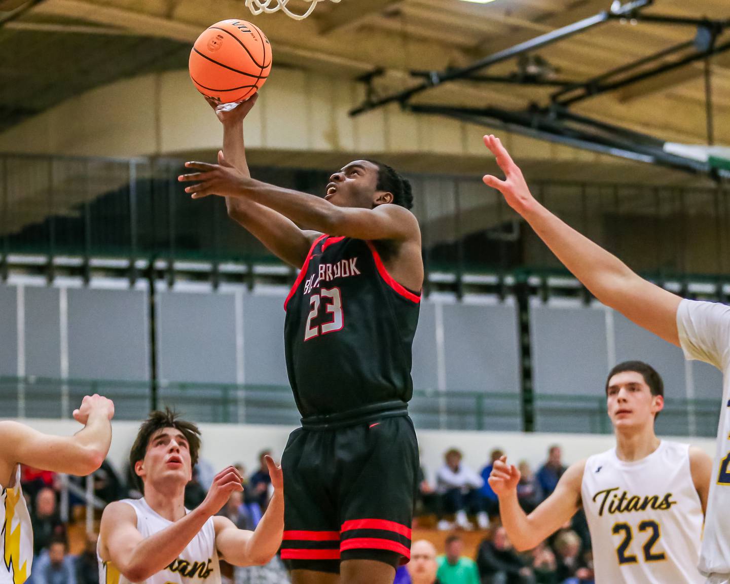 Bolingbrook's Kendall Cutler (23) puts in a layup during their Jack Tosh Holiday Classic basketball tournament game between Bolingbrook at Glenbrook South. Friday Dec 27, 2024 in Elmhurst.