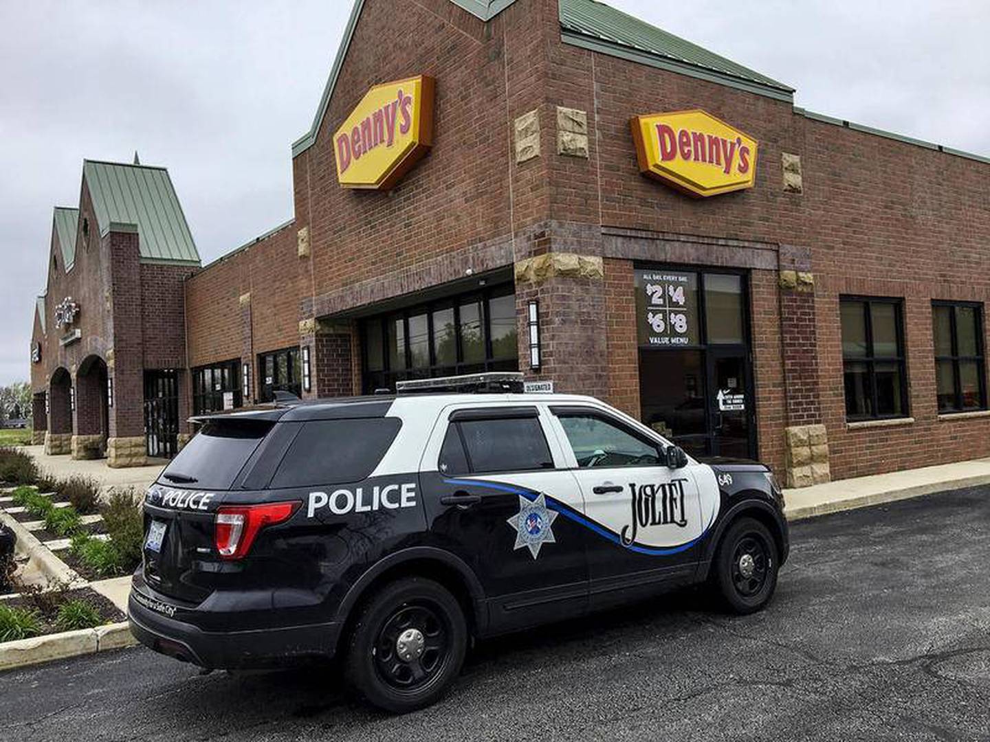 A Joliet Police Department squad vehicle in 2019 sits outside Denny's restaurant, 2531 Plainfield Road, Joliet.