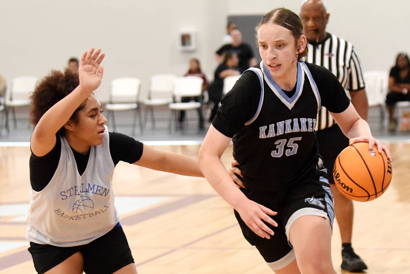 Kankakee's Ava Johnson, right, is guarded by Joliet Central's Melani Tua-Link during a game at the Kankakee Live event at the Genevra Walters Community Center Saturday, June 14, 2025.
