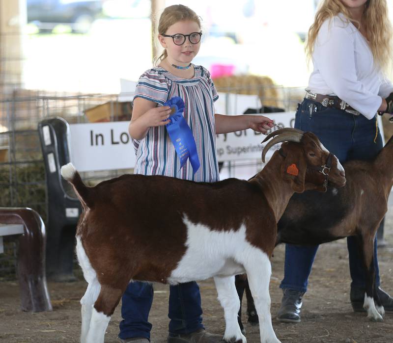 Ana Ehnis of Washburn smiles as she wins best of show in the goat arena during the Marshall-Putnam 4-H Fair on Wednesday, July 19, 2023 in Henry.