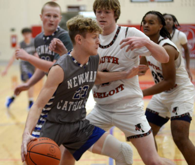 Sterling Newman's Lucas Simpson (23) drives the baseline as South Beloit's Ross Robertson (2) defends during the championship game at the Oregon Thanksgiving Tournament on Saturday, Nov. 25, 2023 at the Blackhawk Center in Oregon.