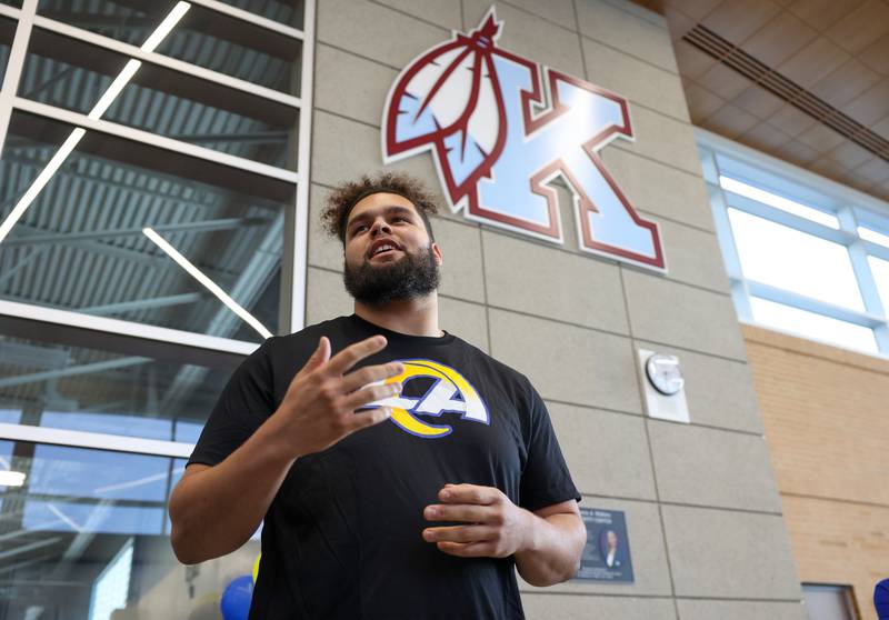 Keagen Trost, a 2019 Kankakee High School grad, speaks to the crowd during a celebration held for him at the school on May 4, 2026, following him being drafted into the NFL to the Los Angeles Rams.