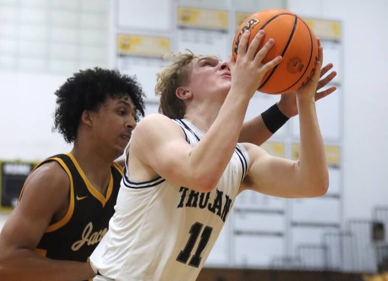 Cary-Grove’s Landon Nawracaj moves the ball against Jacobs during Hinkle Holiday Classic varsity boys basketball tournament action on Thursday, Dec. 26, 2024 at Jacobs High School in Algonquin.