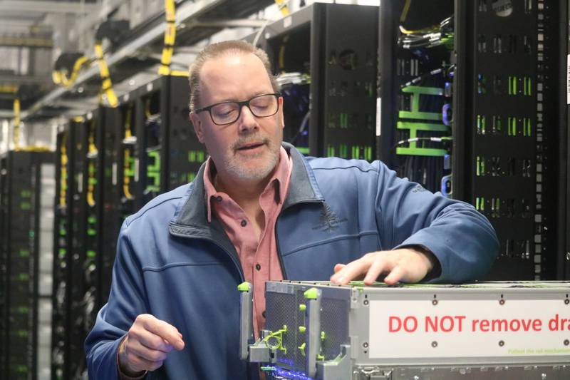 Michael Reffle, director of site operations north for Meta's DeKalb Data Center, gives a tour of the data storage spaces which are carefully temperature controlled at the campus, 2050 Metaverse Way, DeKalb on Wednesday, Nov. 29, 2023. The data center's servers are now operational. Once complete, the campus will house more than 2.3 million square feet across five buildings.