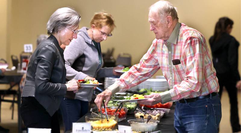 Diners hit the salad bar Friday, March 20, 2026, during the annual Lenten season fish fry at Faranda’s Banquets in DeKalb. The fish fries are 4 to 8 p.m. Fridays through April 3 at the banquet center and a portion of the procedes go to support multiple social service agencies in DeKalb County.