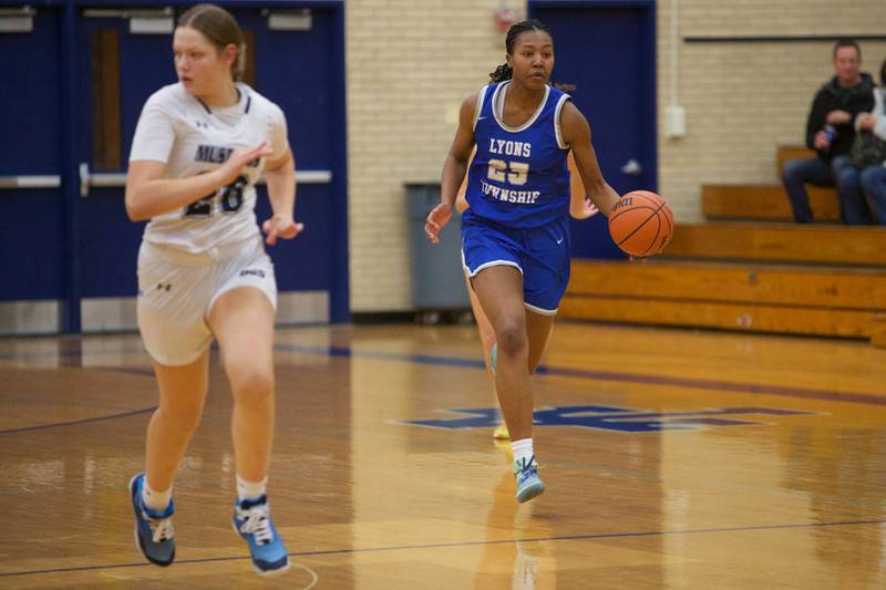 Lyons Nora Ezike leads the break away against Downers Grove South at the West Suburban Conference Crossover Championship on Wednesday, Feb.8,2023 in Addison.