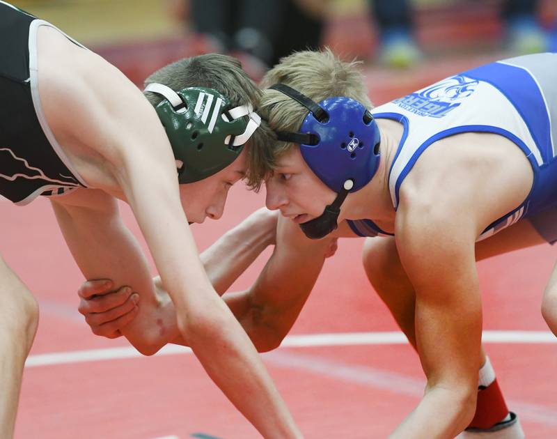West Carroll's Connor Knop and Princeton's Augustus Swanson wrestle at 106 pounds at the 1A Oregon Sectional on Saturday.